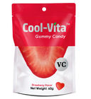 A morango engraçada das vitaminas gomosas saborosos do fruto projetou 60g pequeno dado forma coração pelo saco